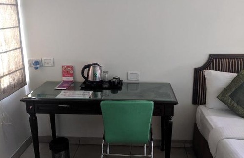 Shivaji Nagar Hotel | Cubbon Suites - 10 Minute walk to MG Road, MG Road Metro and Church Street