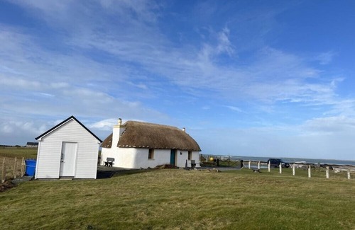 Homore Cottage | CUIR NA BHOIR, pet friendly, with a garden in Creagorry
