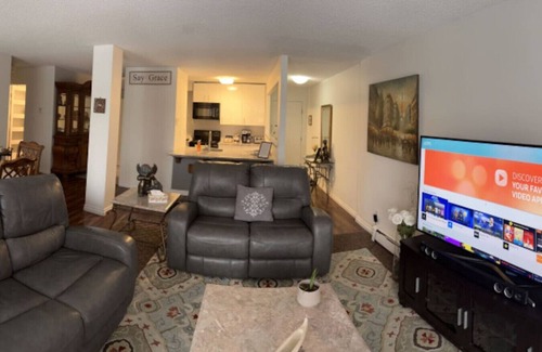 North Central Edmonton Condo | Curved TV | Gym | Parking | Pets | Recliners