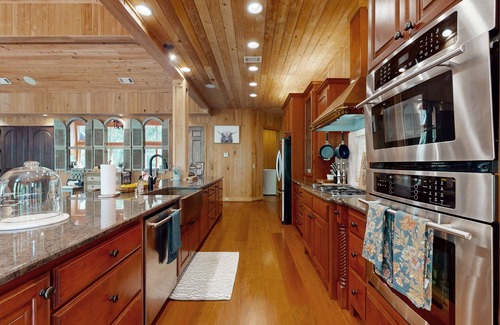 Dahlonega Cabin | Custom riverfront retreat with private pond, dock, firepit & outdoor living