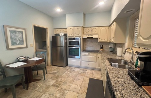 Garland House | Cute cozy cottage with in-ground lap pool! Enjoy the summer in the back yard!