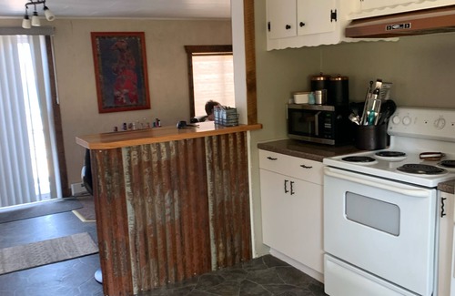 Big Arm Cabin | Cute lakefront cabin with private dock. Pet Friendly