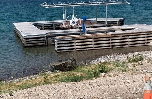 Big Arm Cabin | Cute lakefront cabin with private dock. Pet Friendly