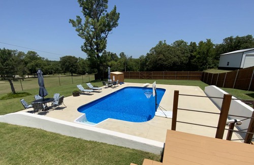 Sulphur House | Cute newly remodeled home with an in ground pool and huge back yard.