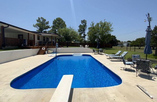 Sulphur House | Cute newly remodeled home with an in ground pool and huge back yard.