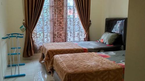 Sumatra House | DAHNIAR Homestay Syariah