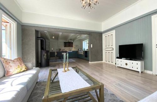 Tokke Villa | DALEN - Full house with two bedrooms, patio, garden and central location