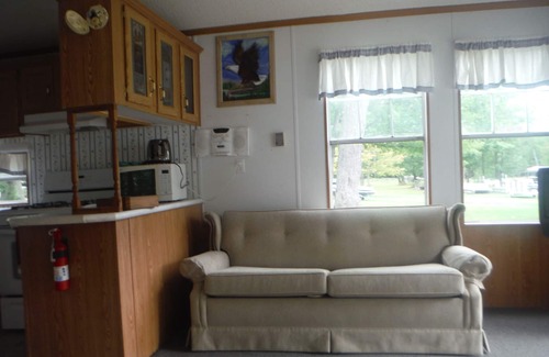 Curtis House | Darling Park Model Trailer downtown Curtis with views of South Manistique Lake