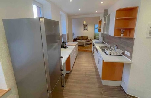 Osthofen Apartment | Das Haus am Bach-schöne Große Wohnung mit Terrasse