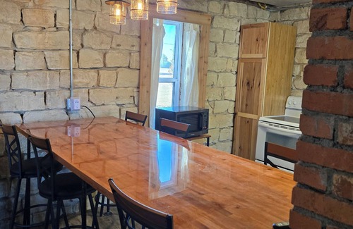 Pfeifer House | Das Stein Haus! Charming 2-bedroom limestone house in Liebenthal, Kansas.