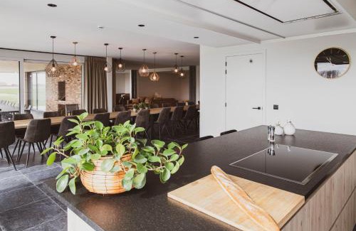 Houtave House | De Balloo, vakantiehuis met sauna en jacuzzi