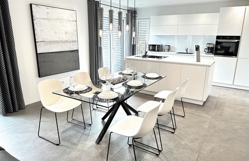 Langweid Apartment | Exclusive Designer - Holiday apartment Black White 124 m²