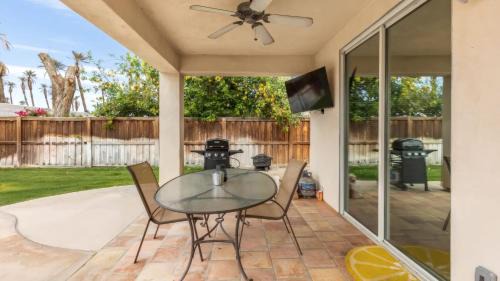 Coachella House | Desert Oasis w Pool Spa BBQ Outdoor Dining Under the Palms Calle Tolosa by AvantStay