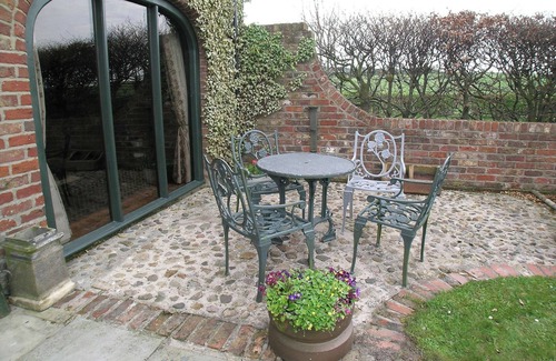 Buckton Cottage | Deceptively spacious and cosy cottage with enclosed gardens and hot tub.