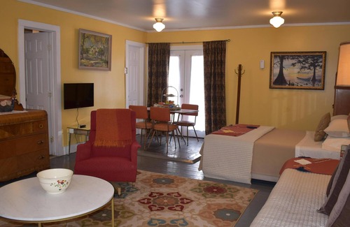 Jeffersonville House | Deck House sleep 4 guests with queen bed, single bed with trundle, private bathroom.