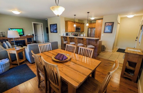 Golden Condo | Deckview: 2-bedroom top floor condo with hot tub and mountain views