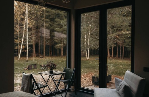 Ligatne Cabin | Deer Station. Dream black cabin in the woods.
