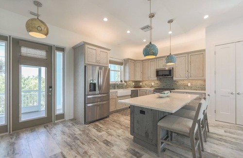 Sanibel House | DEJA BLUE | Lux Canal-Front Sanibel Home with Saltwater Pool and View
