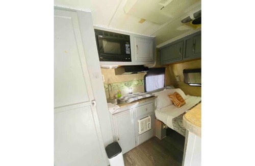 Johnston House | Delightful 1-bedroom camper/RV. Shower and A/C!