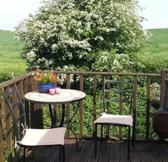 Fence Other | Delightful 3 bedroom holiday home with balcony overlooking fields and a stream