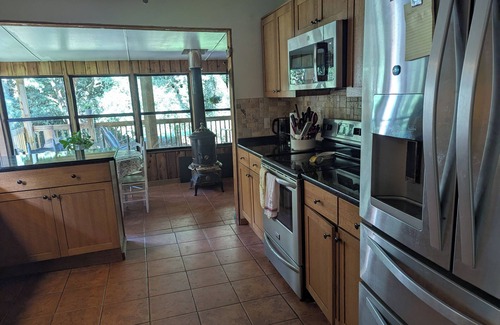 Picayune House | Delightful 4-BR with pond, deck, spacious yards in Picayune