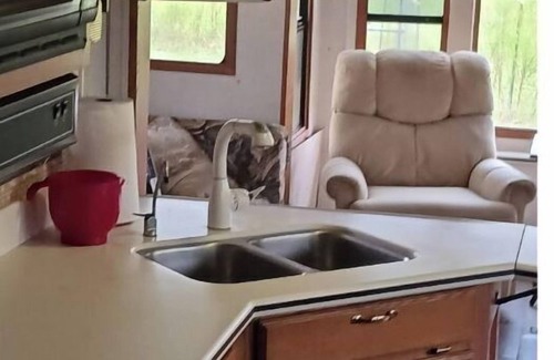 Madison House | Delightful 5th wheel w/queen bed, patio deck, and high speed internet.