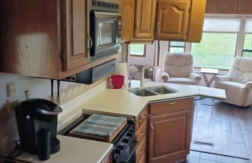 Madison House | Delightful 5th wheel w/queen bed, patio deck, and high speed internet.
