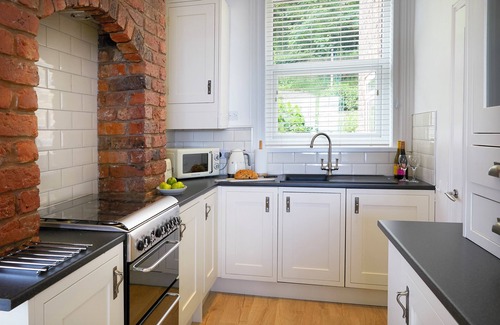 Muston Apartment | Delightful beachfront apartment, 2 bedroom, sleeps 4 - parking & stunning views.