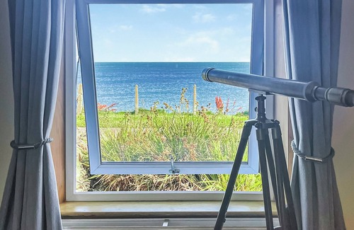 Drummore Cottage | Delightful cottage overlooking Luce Bay, with open fire and enclosed garden.