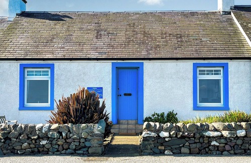 Drummore Cottage | Delightful cottage overlooking Luce Bay, with open fire and enclosed garden.