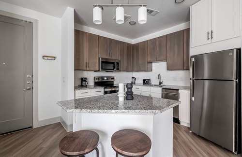 Waller Creek District Apartment | Delightful Downtown 1BR w/Deck & Gym, nr Congress Ave, by Blueground