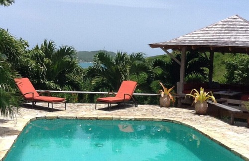 Falmouth Harbour Apartment | Delightful Garden Hideaway with Lovely Views Over the Bay