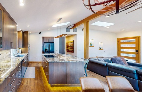 Blue Heron House | Delightful Retreat with Water Views, Fast WiFi, Gas Grill, & Furnished Patio