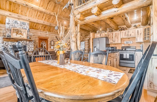 Thompsonville Cabin | Delightful Riverfront Cabin with Wood-Burning Fireplace and Gas Grill & Hot Tub