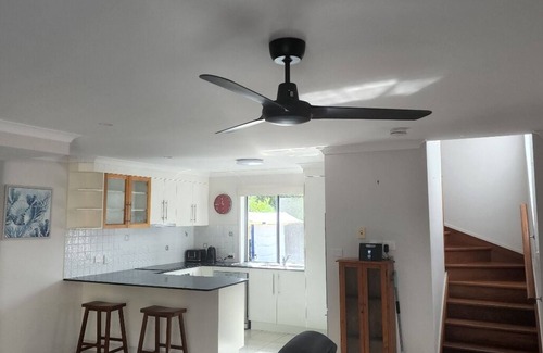 Tin Can Bay Apartment | Delightful three bedroom unit by the beach. Beautiful sunsets
