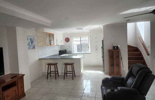 Tin Can Bay Apartment | Delightful three bedroom unit by the beach. Beautiful sunsets