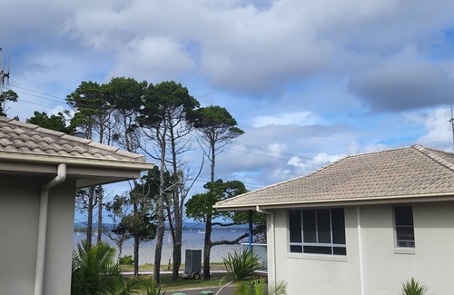 Tin Can Bay Apartment | Delightful three bedroom unit by the beach. Beautiful sunsets