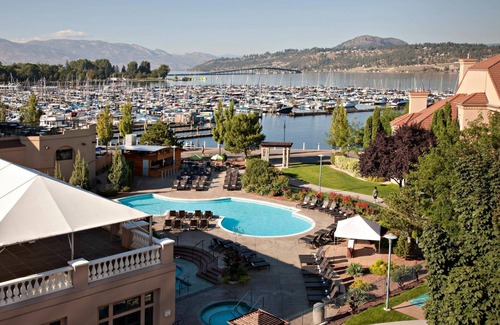 Kelowna Central Business District Apartment | Delta Grand 2 Bedroom Condo full kitchen sleeps 6 partial lake view - Renovated