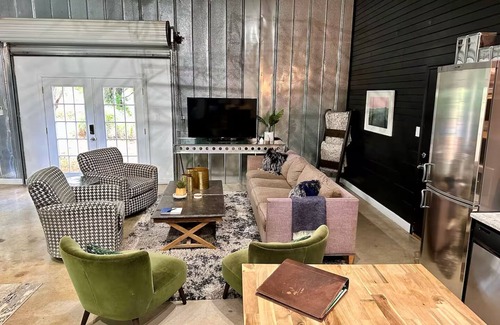 Maryville Apartment | Deluxe Aircraft Hangar Mid-Mod Design Next to Smoky Mountains!