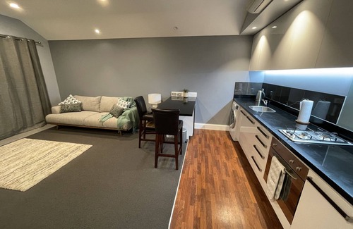Queenstown Apartment | Deluxe Alpine Village Apartment with Stunning Lake Views