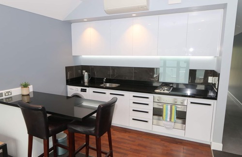 Queenstown Apartment | Deluxe Alpine Village Apartment with Stunning Lake Views