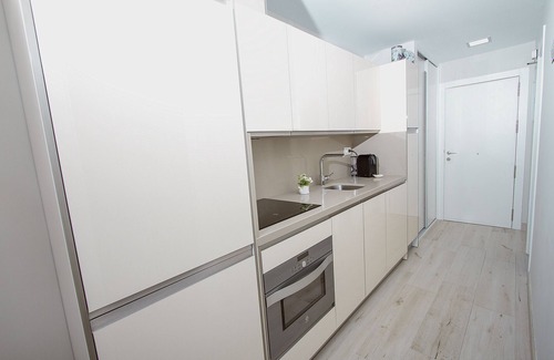 Torremolinos Apartment | DELUXE APARTMENT- BEACHFRONT, SWIMMING POOL, A/A, FREE WIFI AND PARKING