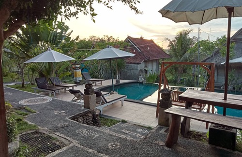 Ceningan Island Ski Chalet | Deluxe bungalow garden view