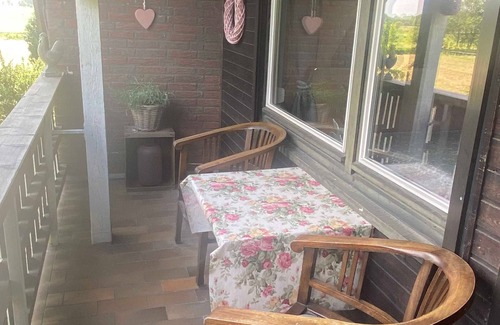 Osterholz-Scharmbeck Apartment | Deluxe double room with balcony - bed&breakfast Worpsweder Blick