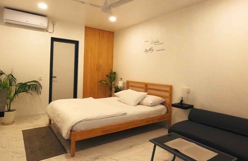 Kudahuvadhoo Hotel | Deluxe Garden Villa with Open-Air Bathroom