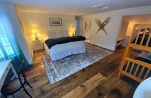 West Dover Resort | Deluxe King, Living Room w/sofa bed, bunk bed & fireplace