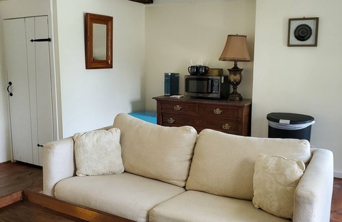 West Dover Resort | Deluxe King Suite, Living Room w/sofa bed & fireplace