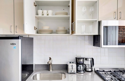 Chinatown Apartment | Deluxe LES 1BR w/W/D, steps to B/D Train & Park, by Blueground