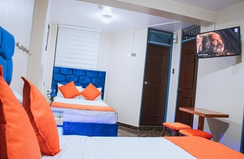 Santiago de Surco Apartment | Deluxe Queen Room with Two Queen Beds 4