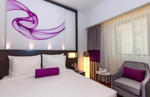 Al Muraqqabat Hotel | Deluxe Room Near Al Rigga Metro By Luxury Bookings